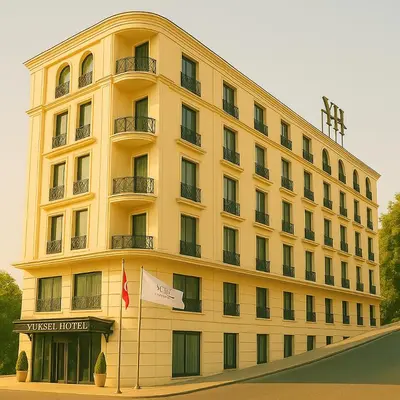 a large yellow building with a flag in front of it at Yuksel Istanbul Yenikapı Hotel in Istanbul