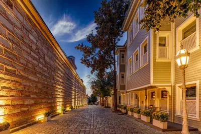 a cobblestone street between two buildings at Hagia Sofia Mansions Istanbul, Curio Collection by Hilton in Istanbul