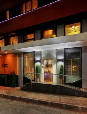a facade of a building with potted plants at Jazz Hotel Nisantasi in Istanbul