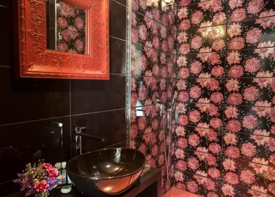 a bathroom with a sink and a floral wall at Hypnos Design Hotel in Istanbul