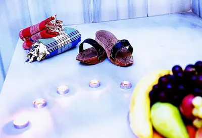 a group of shoes and fruit on a table at Gülhanepark Hotel & Spa in Istanbul