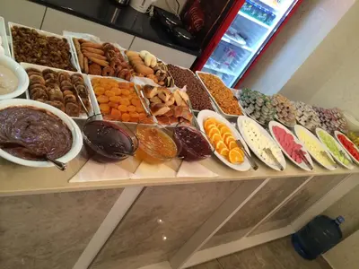 a buffet of different types of food on a table at Nova Roma Hotel in Istanbul