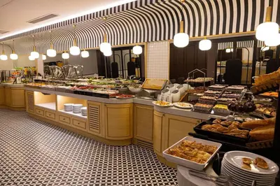a buffet line with many different types of food at Hotel Eyfel in Istanbul