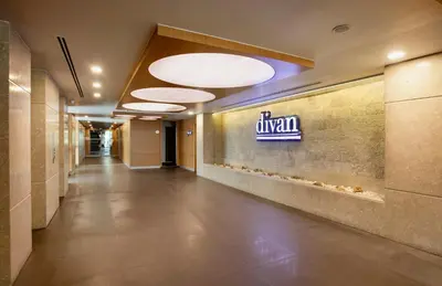 a hallway in a hospital with a sign on the wall at Divan Corlu in Corlu