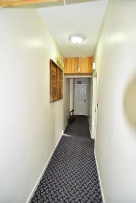 an empty hallway with a room with a hallway at Hotel Han in Istanbul