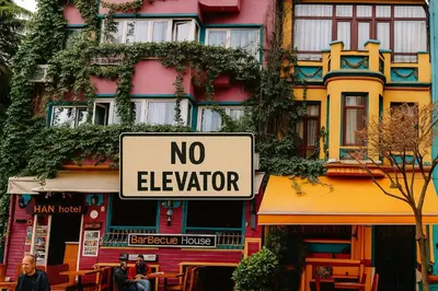 a no elevator sign in front of a building at Hotel Han in Istanbul
