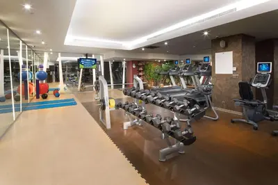 a gym with treadmills and cardio equipment in a room at DoubleTree By Hilton Istanbul - Old Town in Istanbul