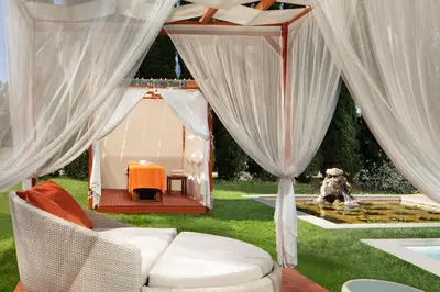 a dog sitting in front of a gazebo at Sheraton Istanbul Atakoy Hotel in Istanbul