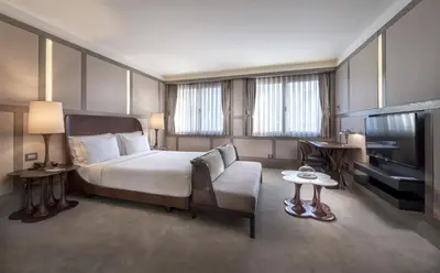 a hotel room with a bed and a television at The Stay Nisantasi in Istanbul