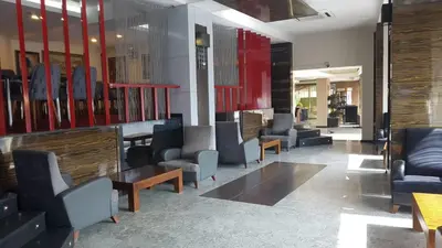 a waiting room with chairs and a table at Lion City Hotel Bursa in Bursa