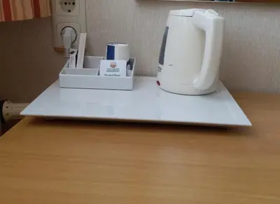 a coffee maker on a shelf in a room at Hotel Inter Istanbul in Istanbul