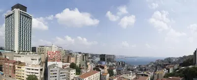 a view of a city with tall buildings at Innpera Hotel in Istanbul