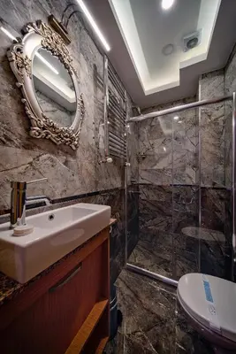 a bathroom with a sink and a shower at Gulhane Corner Hotel in Istanbul