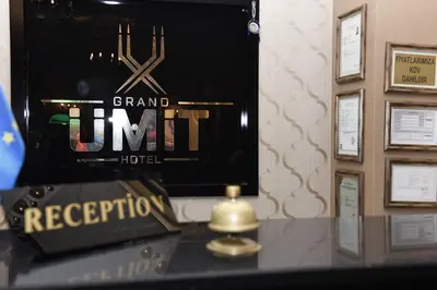 a table with a sign that reads grand mint recreation at Hotel Grand Umit in Istanbul
