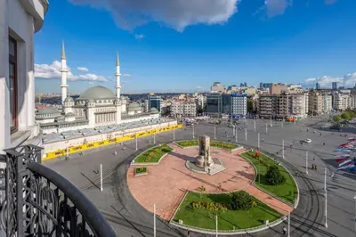 a view from a balcony of a city with a mosque at Taxim Hill Hotel in Istanbul