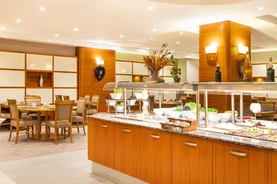 a restaurant with a buffet line with a dining room at Vicenza Hotel Istanbul Old City in Istanbul