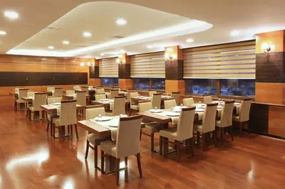 a large dining room with tables and chairs at Balturk Hotel Sakarya in Sakarya