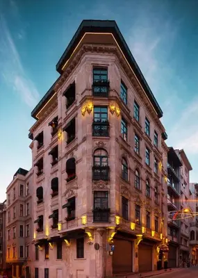 a large stone building with lights on it at GALATA M84 in Istanbul