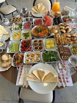 a table with a bunch of food on it at Grand Ons Hotel in Istanbul