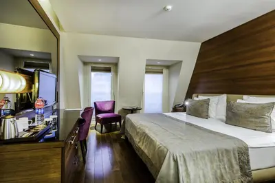 a hotel room with a bed and a television at Levni Hotel & SPA - Special Category in Istanbul