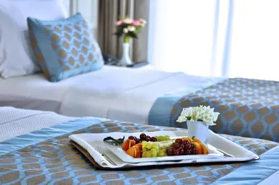 a plate of fruit on a table in a hotel room at Beethoven Hotel & Suite in Istanbul