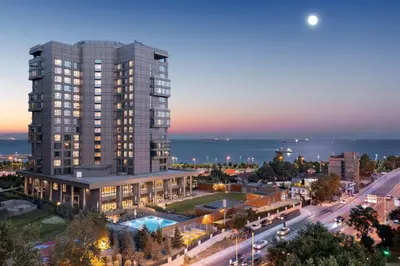 a rendering of a building in a city at night at Hilton Istanbul Bakirkoy in Istanbul