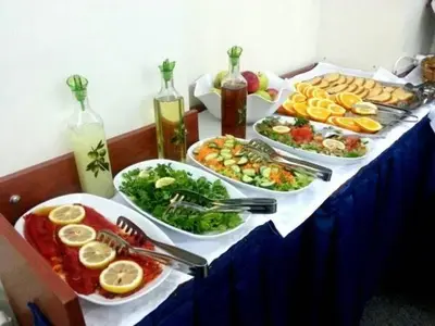 a table with several plates of food on it at Antik Ipek Suit in Istanbul