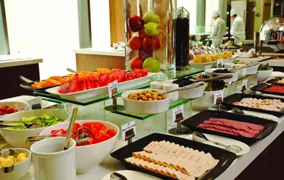 a buffet line with many different types of food at Crowne Plaza Istanbul Harbiye by IHG in Istanbul