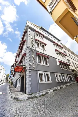 a building on a street in a city at Dara Old City Hotel in Istanbul