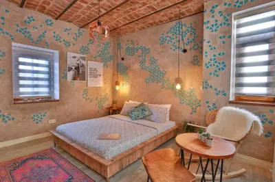 a small bedroom with a bed and a table at Flats Company -Mujgan Apartment in Istanbul
