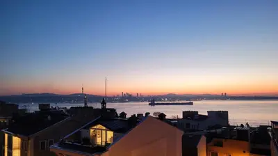 a view of a river with a boat in the water at Marmara Guesthouse in Istanbul