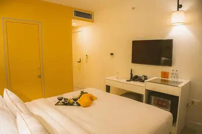 a hotel room with a bed with a stuffed animal on it at Sparkle Hotel in Istanbul