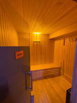 an empty sauna with a sign that says sauna at Hotel Perula & SPA in Istanbul