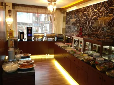 a buffet line with many different types of food at Maya Hotel in Istanbul