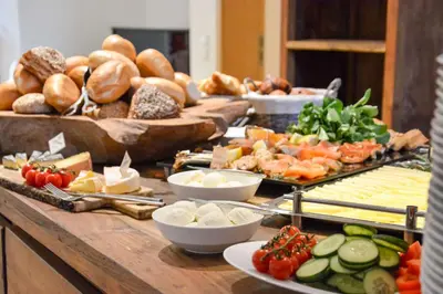 a buffet with different types of food on a table at Park Inn by Radisson Istanbul Airport Odayeri in Istanbul