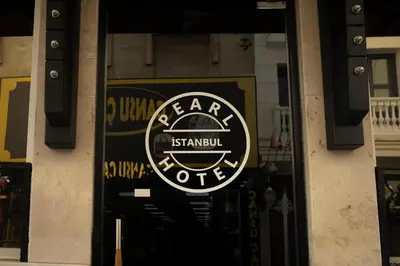 a sign on the door of a store at Pearl Hotel İstanbul in Istanbul