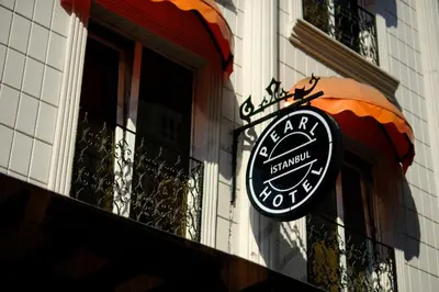 a sign on the side of a building at Pearl Hotel İstanbul in Istanbul