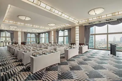 a large room with white tables and chairs at Hyatt Centric Levent Istanbul in Istanbul