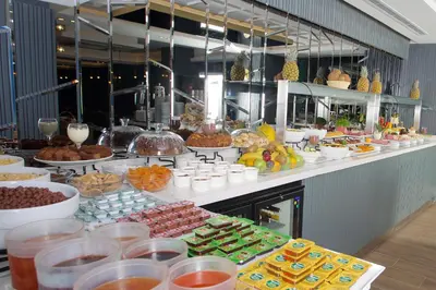 a buffet line with many different types of food at Amethyst Hotel in Istanbul