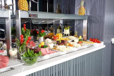 a buffet of food on display in a restaurant at Amethyst Hotel in Istanbul
