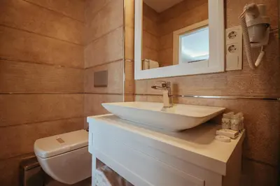 a bathroom with a sink and a toilet at Istanroom by Keo in Istanbul