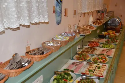 a buffet with many plates of food on display at Sarnic Premier Hotel in Istanbul
