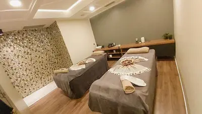 a room with two beds in a room at Sarnic Premier Hotel in Istanbul