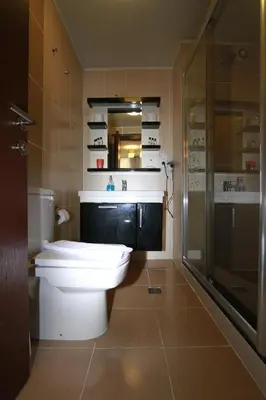 a bathroom with a toilet and a glass shower at Agora Boutique Hotel & Bistro in Istanbul