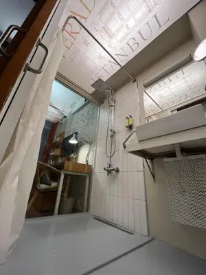 a bathroom with a shower and a sink at Peradays in Istanbul