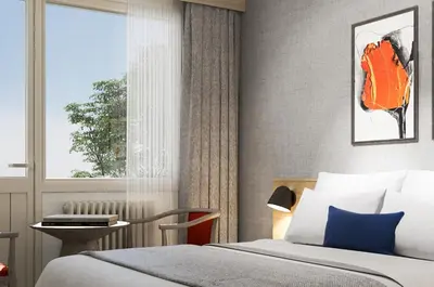 a bedroom with a bed and a window at Erzurumlu Hotel in Kilyos