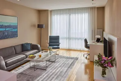 a living room with a couch and a table at Fraser Place Anthill Istanbul in Istanbul