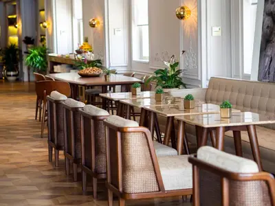 a restaurant with tables and chairs in a room at The Stay Bosphorus in Istanbul