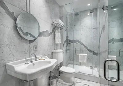 a bathroom with a sink and a toilet and a shower at The Stay Bosphorus in Istanbul