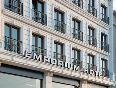 a hotel sign on the side of a building at Emporium Hotel in Istanbul